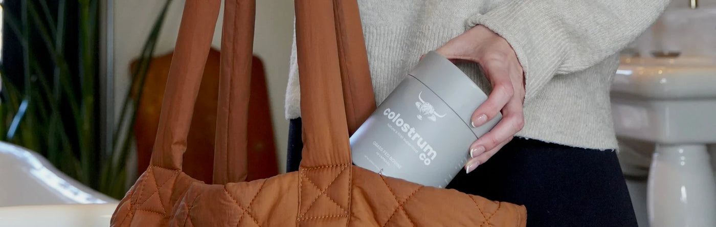 Colostrum Co powder tub on a kitchen surface