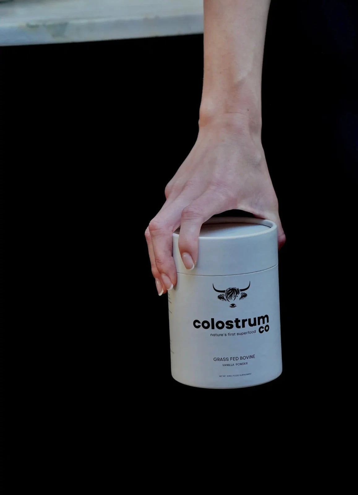 handing a upplement box colostrum